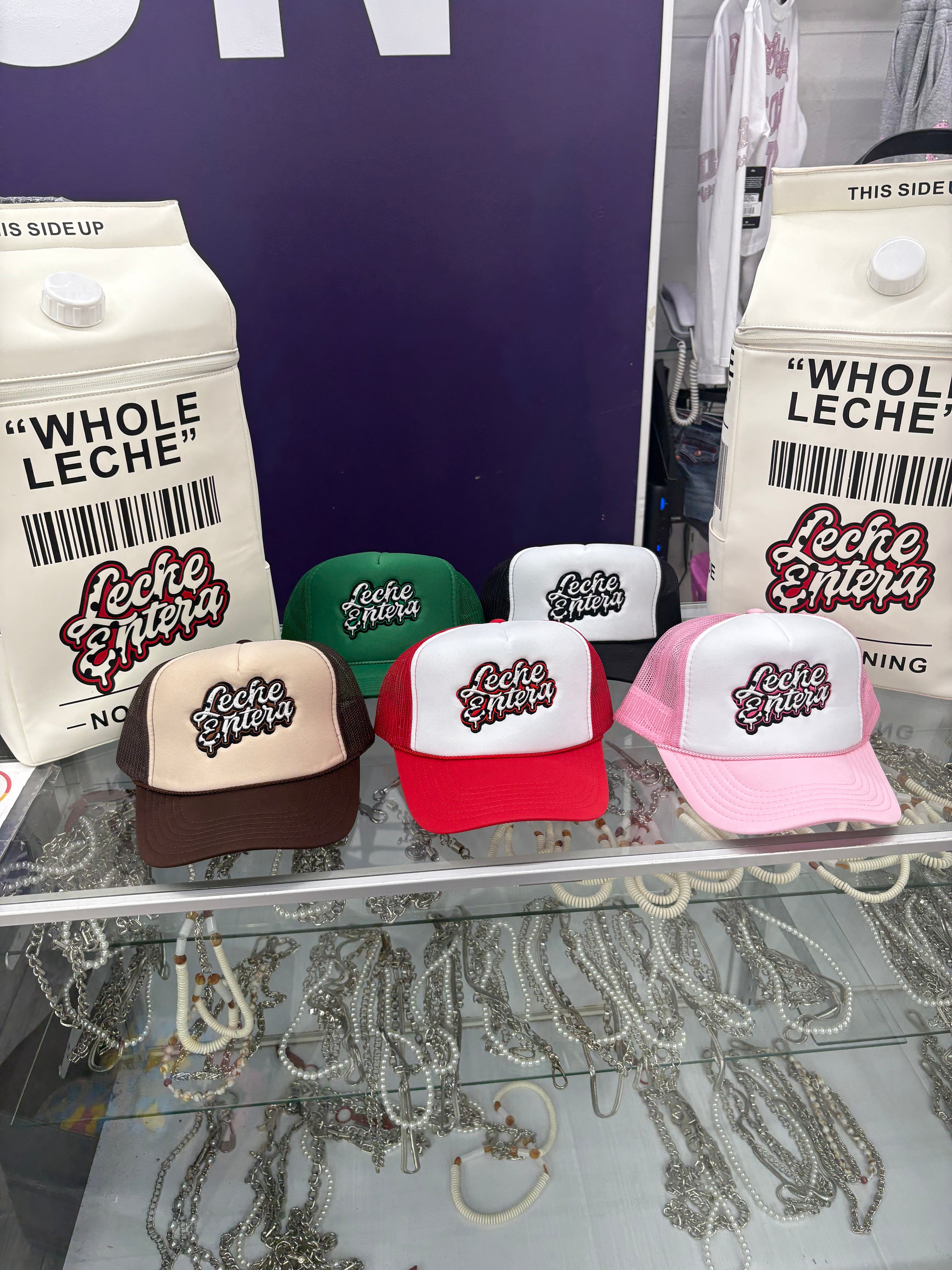Leche Trucker Hats